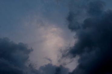 Dark clouds with a lighter sky patch.