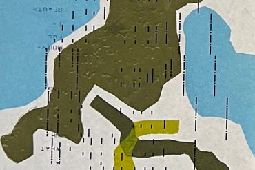 close up of abstract print in greens and blue