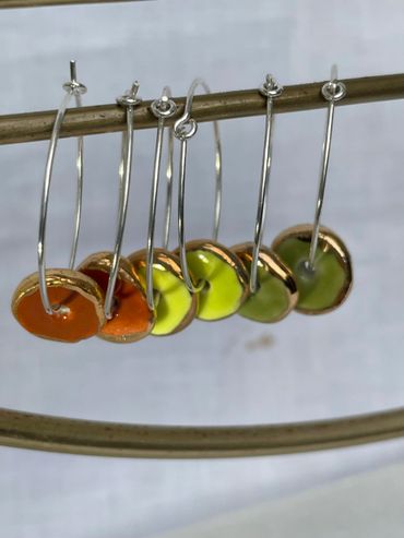 three pairs of ceramic earrings