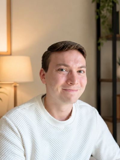 A young man smiling