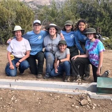 Scout Troop 1602 gathers together after installing a new wildlife friendly drinker.