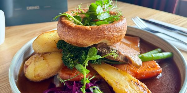 Plated sunday roast with red wine