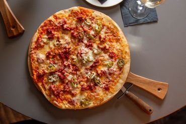 Freshly baked pizza on the table