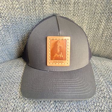 Frida Kahlo holding gun leather patch trucker hat