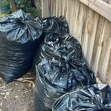 "Yellowstone Junk Removal team clearing household clutter from a San Antonio home."