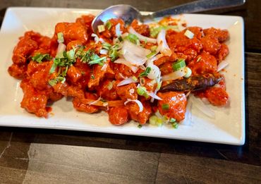 Close-up of flavorful Indian dishes served