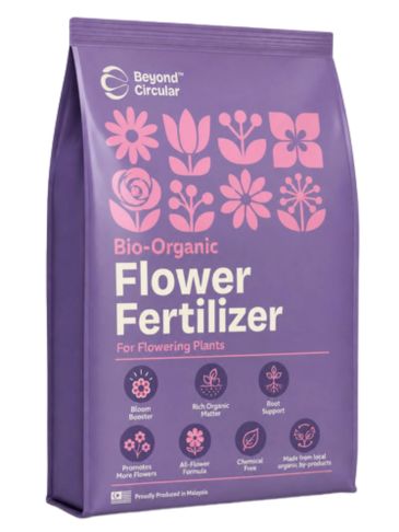 Purple bag of bio-organic flower fertilizer with pink floral icons.