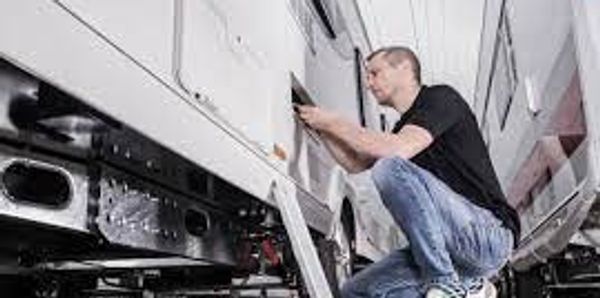 Our RV Technician hard at work checking an RV in for repairs.