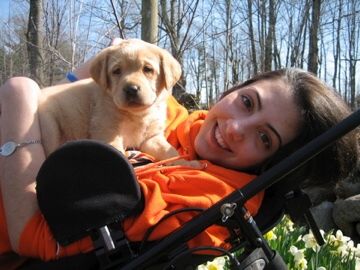 Photo of Stephanie in 2008 on the day she first met her service dog Izzy.