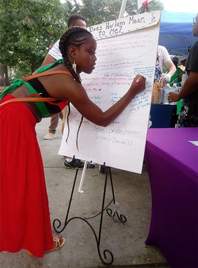 Unidentified woman on Marcus Garvey Day at Marcus Garvey Park, August 17, 2019, at While We Are Stil