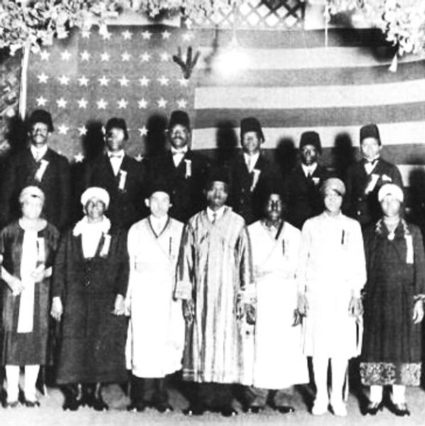 Historical Picture of the Moorish Americans in front of the American flag.