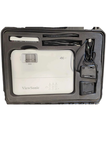 Hardcover case foam laser cut to fit a projector and all its accessories. 