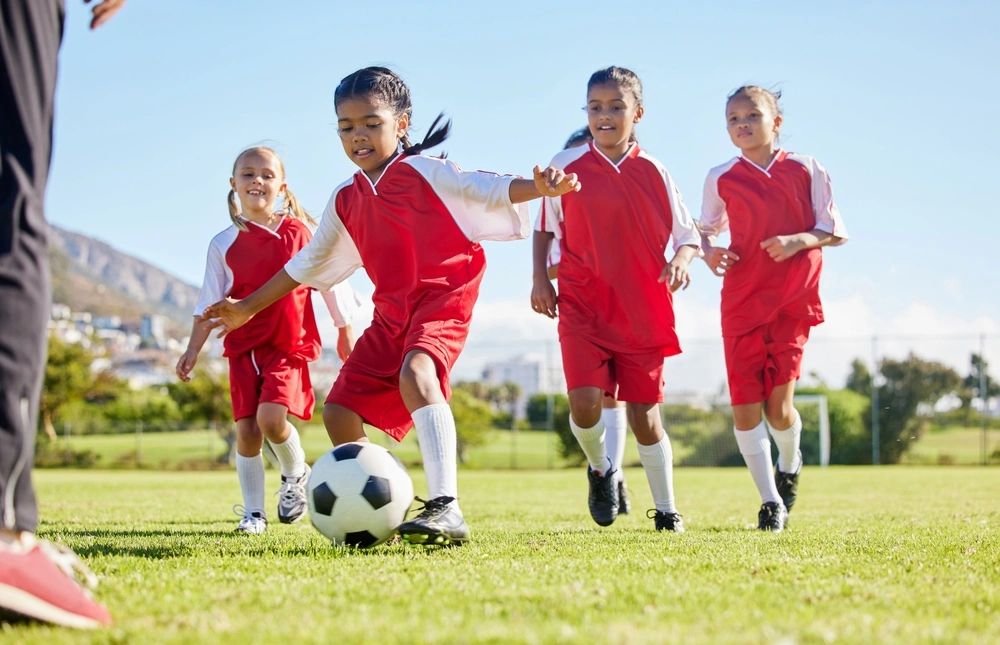 Children playing soccer