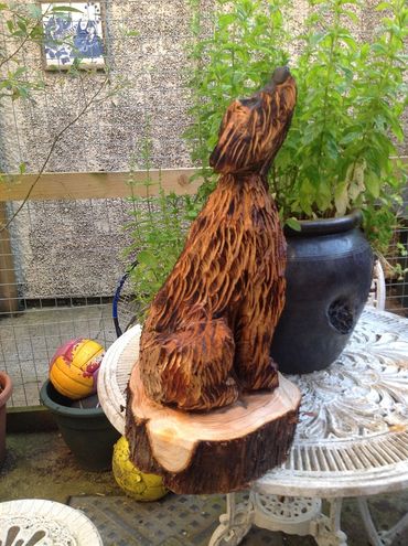 wood carving of dog