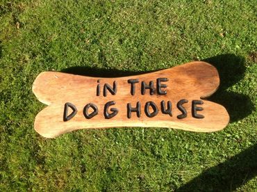 wood carving "in the dog house"