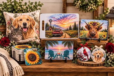 Decorative items with vibrant animal and nature designs on a wooden table.