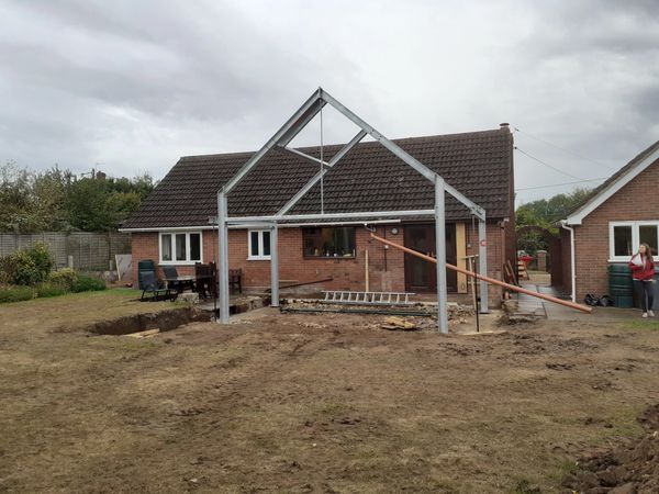 Steelwork frame erected to single storey rear house extension 