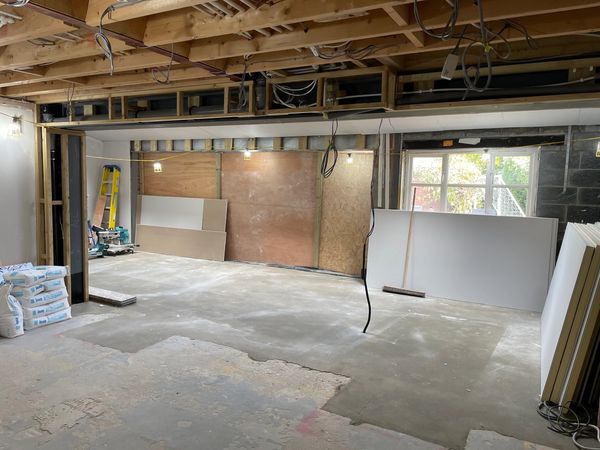 single storey extension during construction showing steelwork  to create open plan living