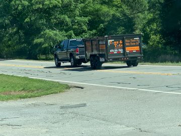 Dumpster trailer being delivered