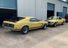 1969 and 1970 Yellow Boss 302 Mustangs