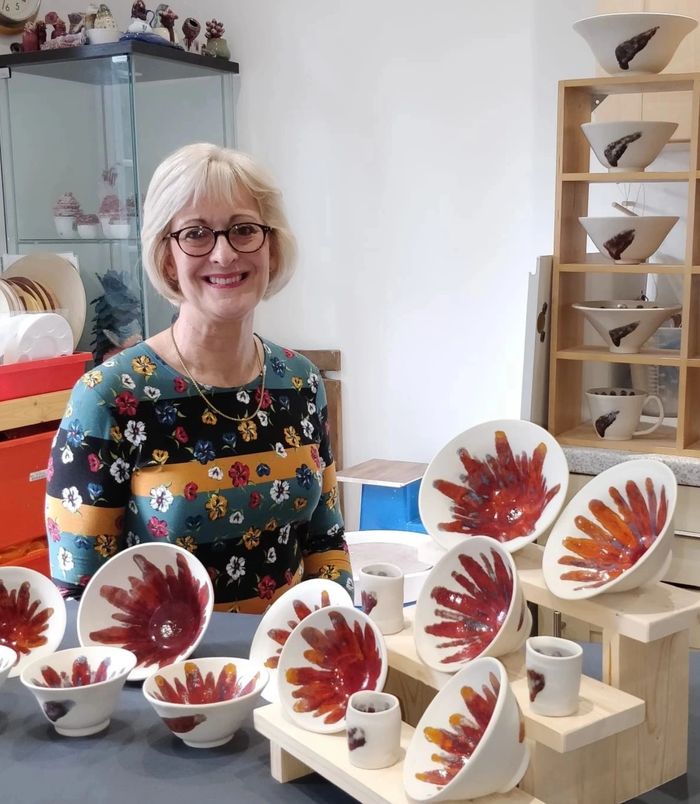Hello and Welcome to my website!  This is me in my studio with a few pieces of my work.