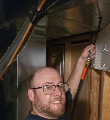 Me using my Air Compressor to Clean out your vents. 