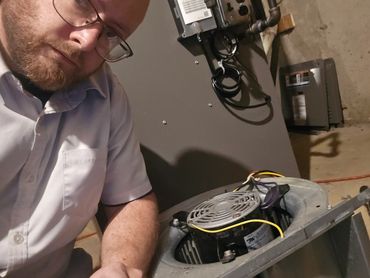Me Cleaning a Blower Motor on a furnace.
