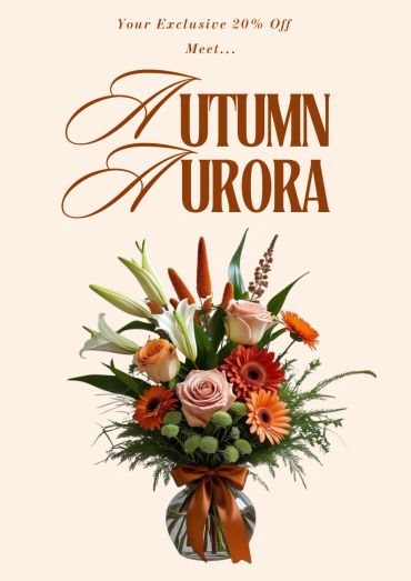 Elegant Autumn Aurora bouquet with roses, lilies, and gerberas in a glass vase, 20% off.