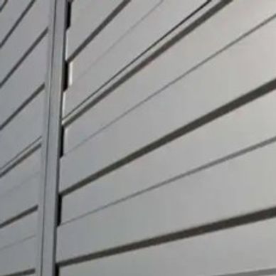 Close-up of metallic horizontal slats on a surface.