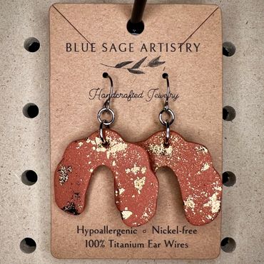Terracotta color arch hanging clay earrings
