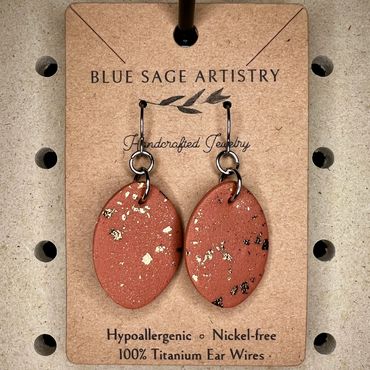Terracotta color oval hanging clay earrings
