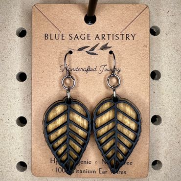 2 layer (top black, bottom stain) hanging leaf earrings 
