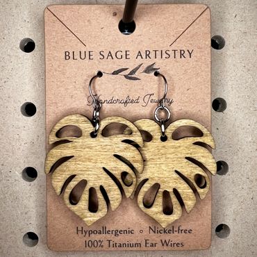 Wood stain monstera earrings