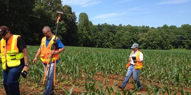 The design is created by Vickie Mckee.  Hundreds of numbered flags are placed in the field. 