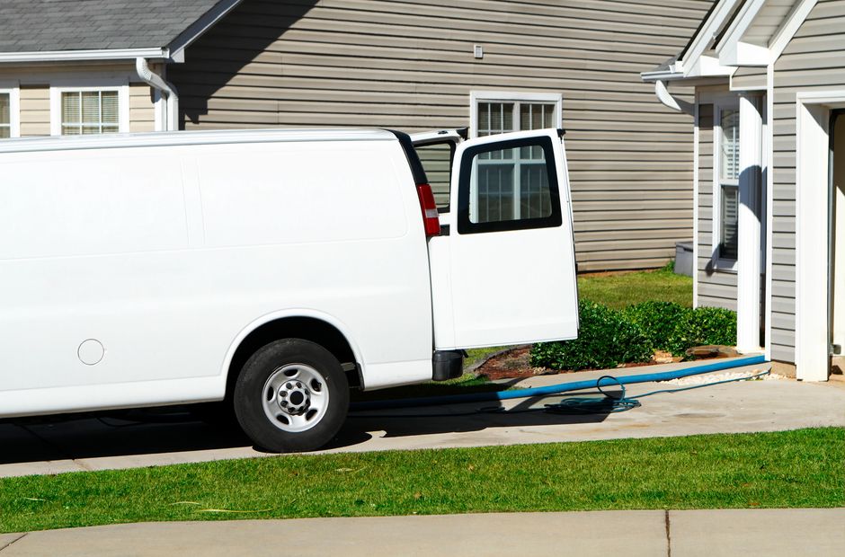 Van mounted carpet cleaning equipment