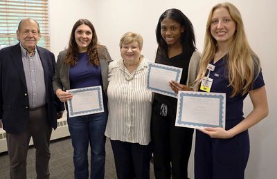 Newcomb Parker Foundation founders Gerald Parker (left) and Nancy Newcomb Parker (center) congratula