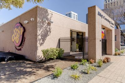 Exterior view of Ally's Literacy Center with clear signage and urban surroundings.