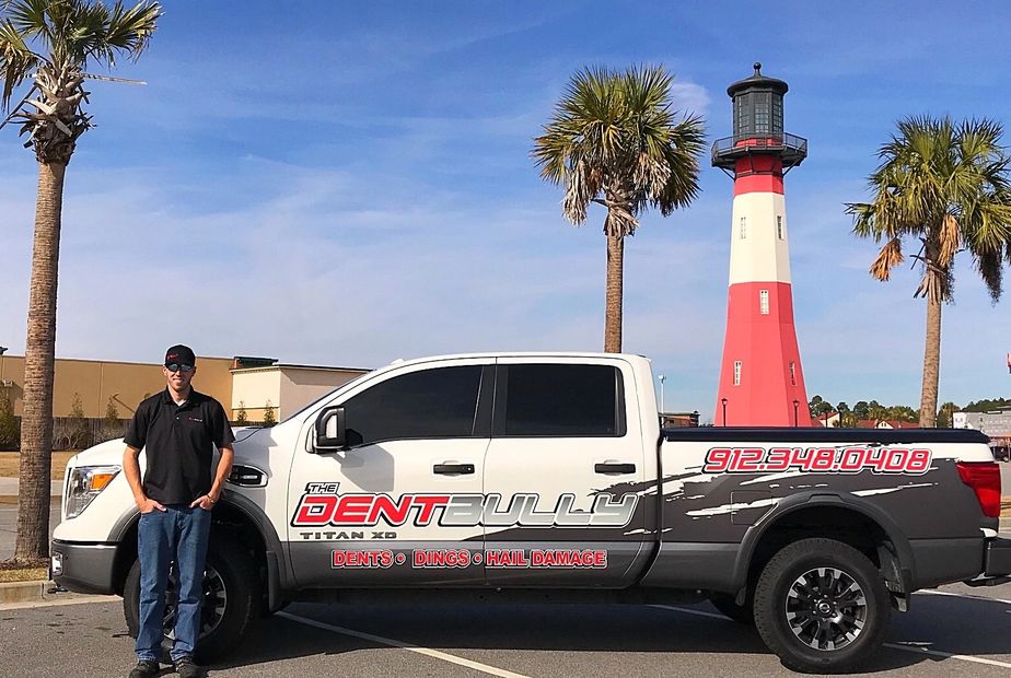 The Dent Bully Paintless Dent Repair truck.