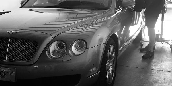 Paintless Dent Repair on a Bentley from Savannah, Georgia.