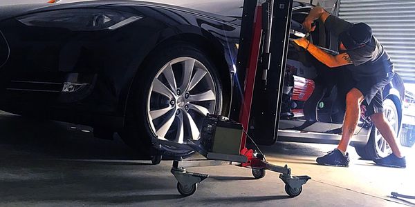 Paintless Dent Repair on a Tesla Model S in Savannah, Georgia.