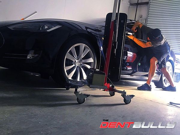 Paintless Dent Repair on a Tesla Model S in Savannah, Georgia.