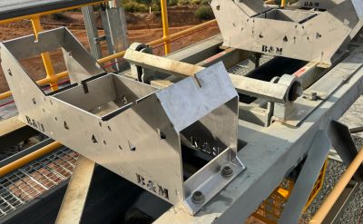 BAMAU weightometer and conveyor belt scale installed on a mining conveyor system.
