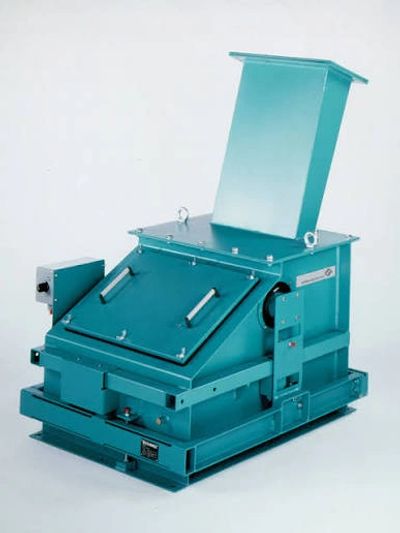 Schenck impact weigher for continuous bulk material flow measurement.