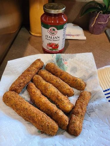 Potato dish with a jar of pasta sauce