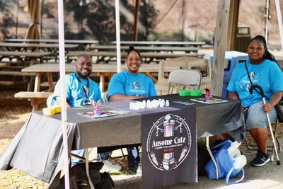 Nonprofit members attending a community event 