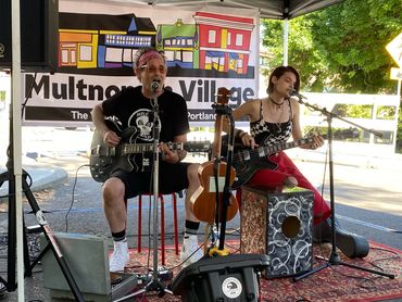 ilan Laks with Tsila at the Multnomah Village Street Fair