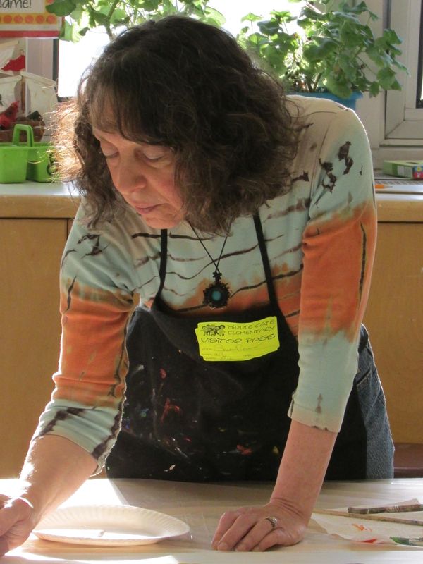 Susan Rosano, Master Teaching Artist and Expressive Arts Therapist working on a mural project.