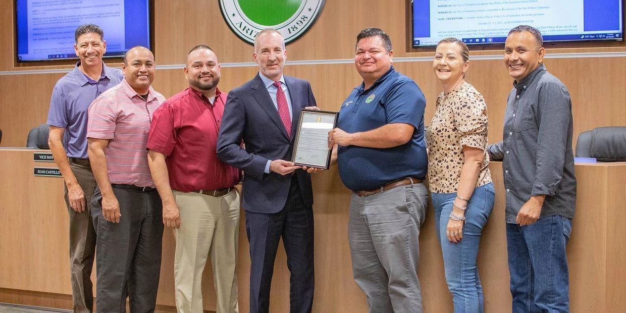 Yuma County Administrator Ian McGaughey receives a proclamation from the Somerton City Council