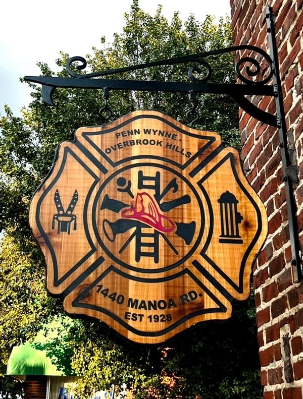 Custom 32"x32" (81 cm x 81 cm) two-sided sign made of cedar, plywood core, epoxy, and fiberglass. 