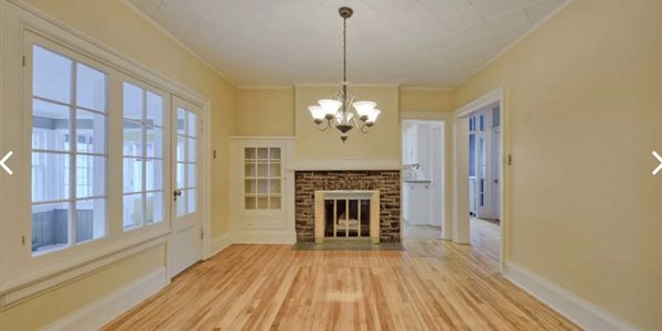 Original dining rm. - fireplace removed to create open concept kitchen / dining with rebuilt porch.